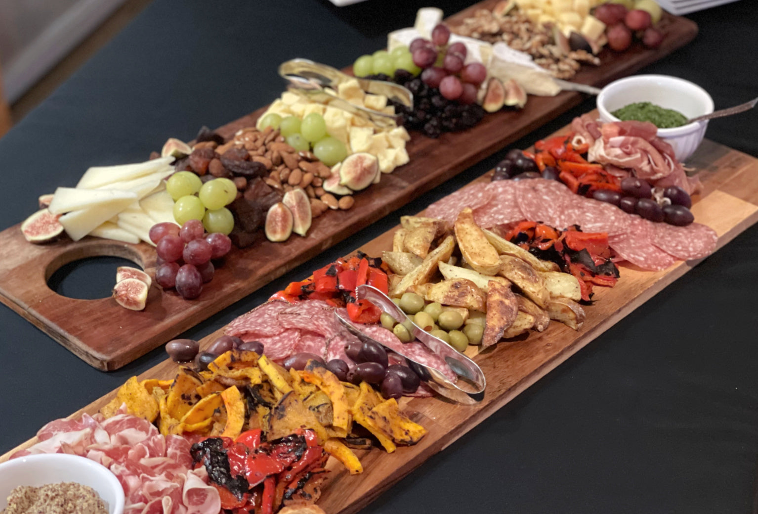 Shef Madres Catering charcuterie tray with grilled vegetables and fruit